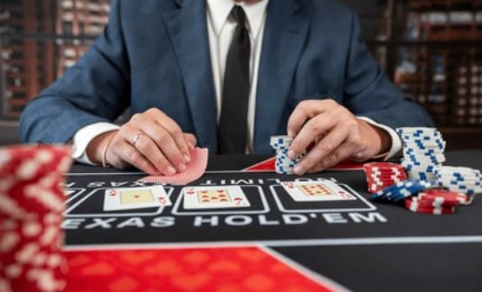 Live dealer studio broadcast showing blackjack table with professional setup